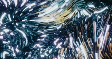 Abstract image featuring swirling, reflective metallic surfaces with bright, elongated streaks of light, creating a dynamic and fluid visual effect.