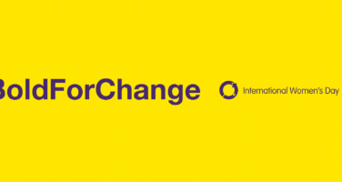Yellow banner with the hashtag #BeBoldForChange, International Women’s Day symbol, and Oliver James Associates logo.