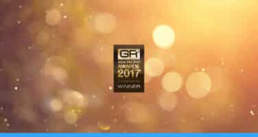 Golden award plaque with text "GR Asia Gaming Awards 2017 Winner" set against a blurred sparkling background.